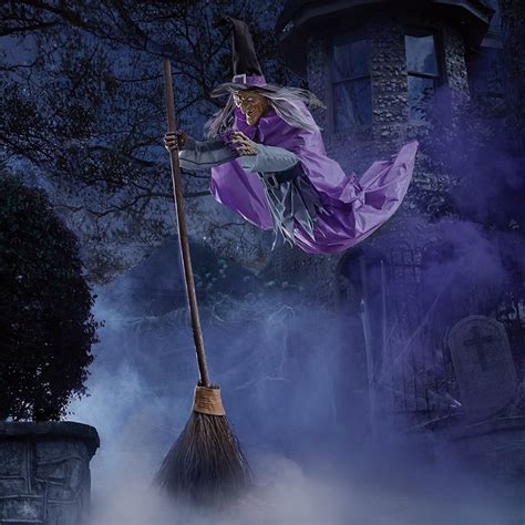 Hovering witch scarecrow